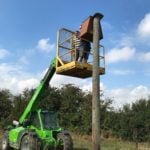 Putting up an owl box, We do anything we can to help here in Great Easton on our Conservation farm