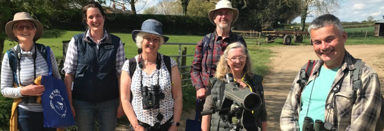 Naturetrek Group with Neil McMahon as a personal tour guide round the farm bird spotting
